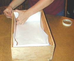 Tape the corners with masking tape.